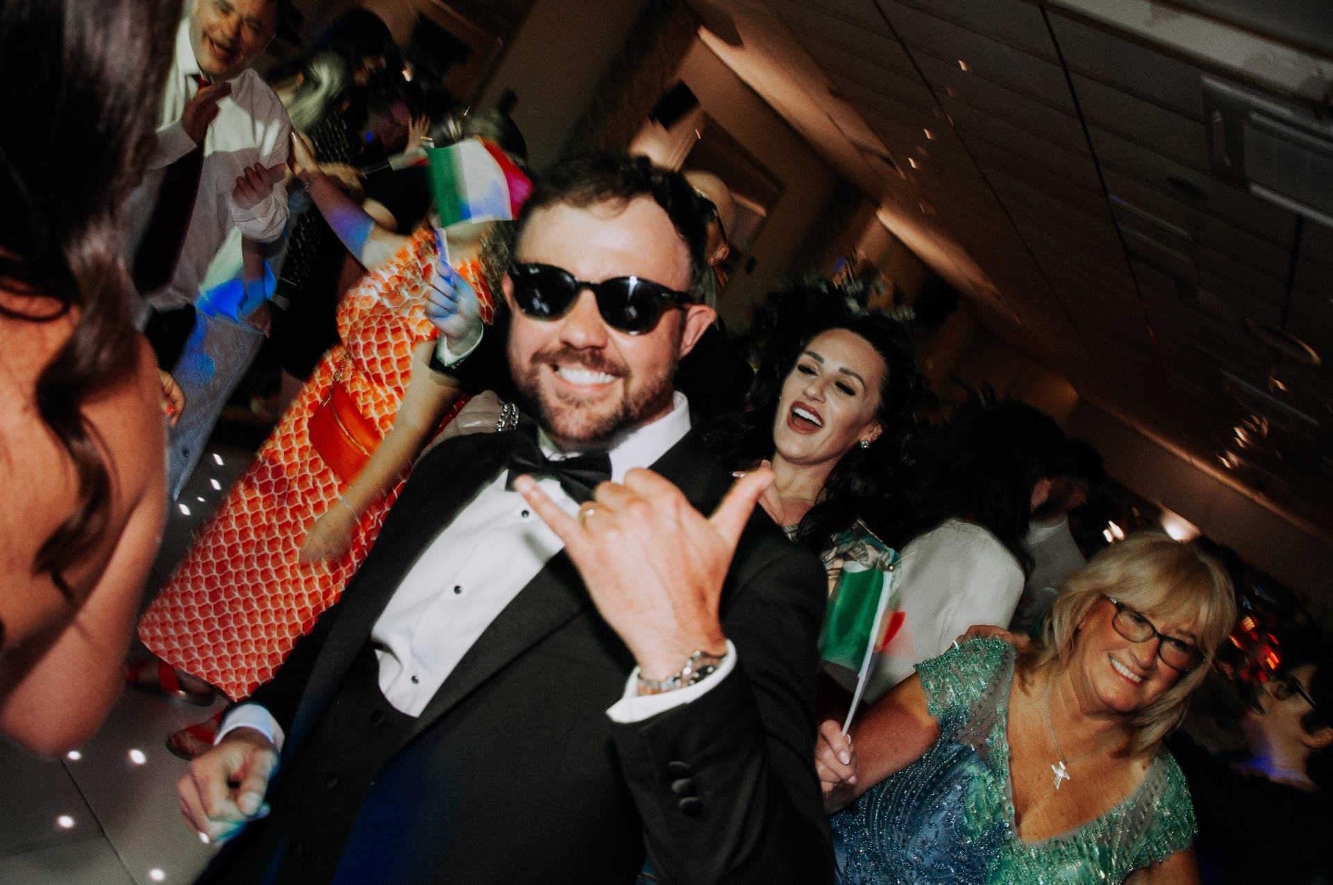 Groom celebrating on the dance floor